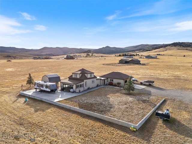 193 Tobe Rd, Ennis, MT 59729 - aerial view of sparsely populated area with a mountain backdrop