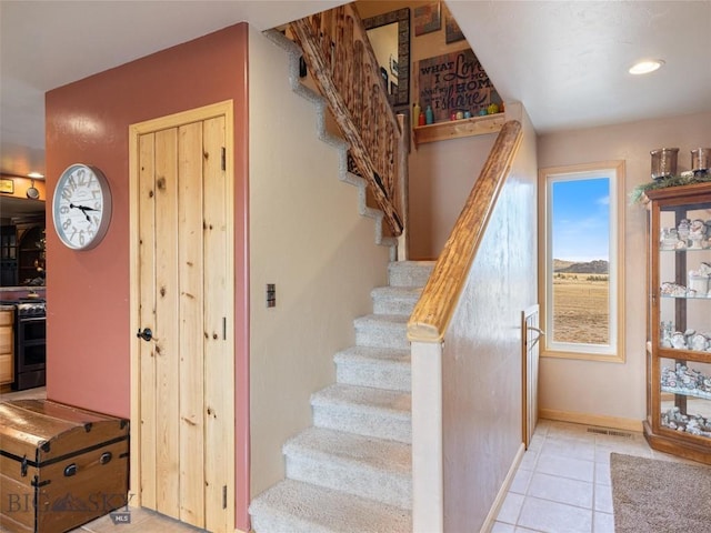 193 Tobe Rd, Ennis, MT 59729 - stairs featuring tile patterned floors and recessed lighting