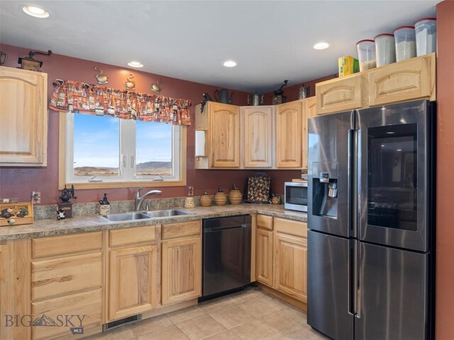 193 Tobe Rd, Ennis, MT 59729 - kitchen with appliances with stainless steel finishes, light brown cabinets, recessed lighting, light countertops, and light tile patterned flooring