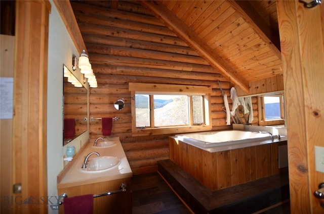 155 Moose Run, Polaris, MT 59746 - full bathroom with rustic walls, double vanity, wood finished floors, wooden ceiling, and lofted ceiling