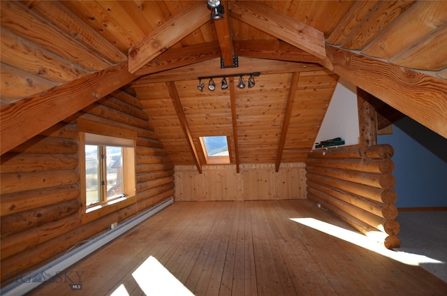 additional living space with a baseboard heating unit, wood-type flooring, wooden ceiling, log walls, and lofted ceiling with skylight