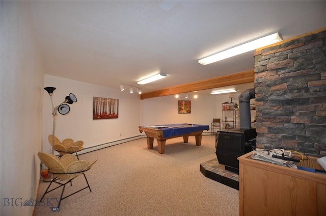 155 Moose Run, Polaris, MT 59746 - game room with baseboard heating, carpet, a wood stove, and billiards table