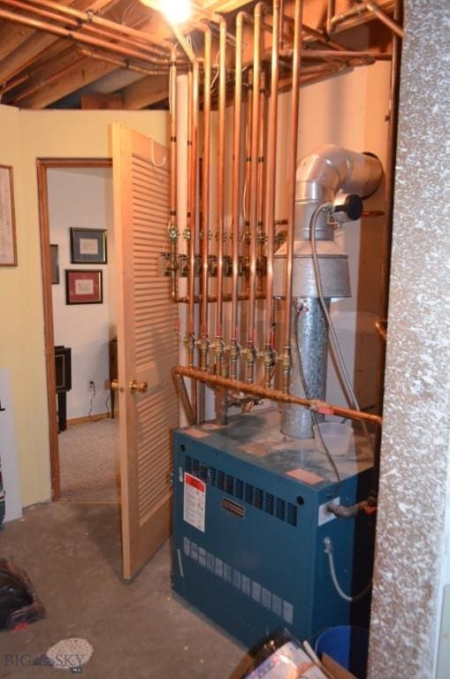 155 Moose Run, Polaris, MT 59746 - utility room featuring a heating unit