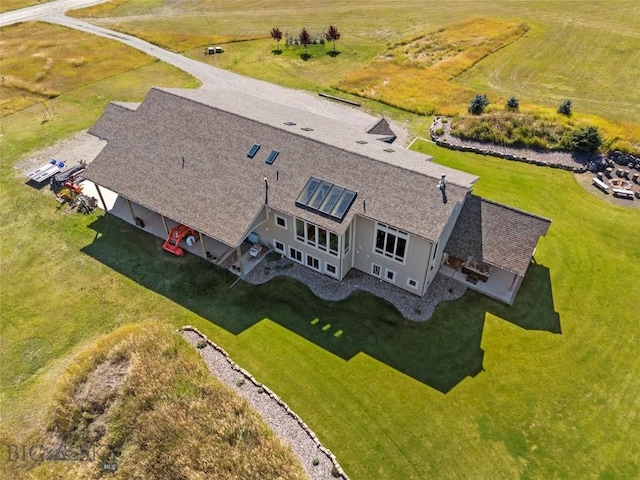 birds eye view of property featuring a rural view