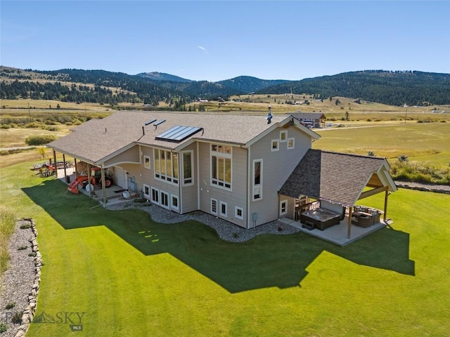 drone / aerial view with a mountain view