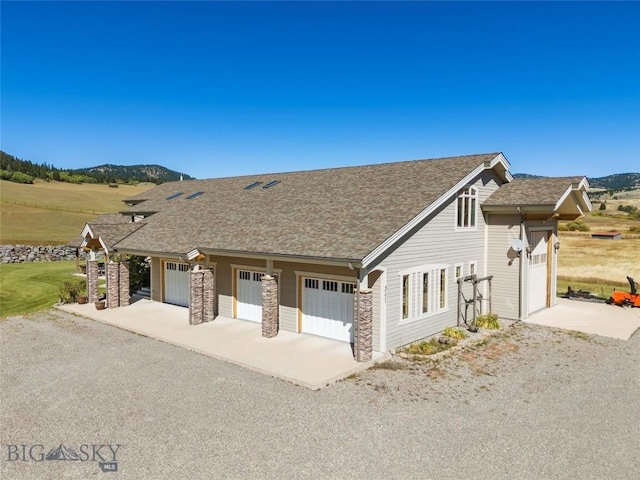 view of front of home with a mountain view