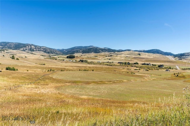 property view of mountains featuring a rural view