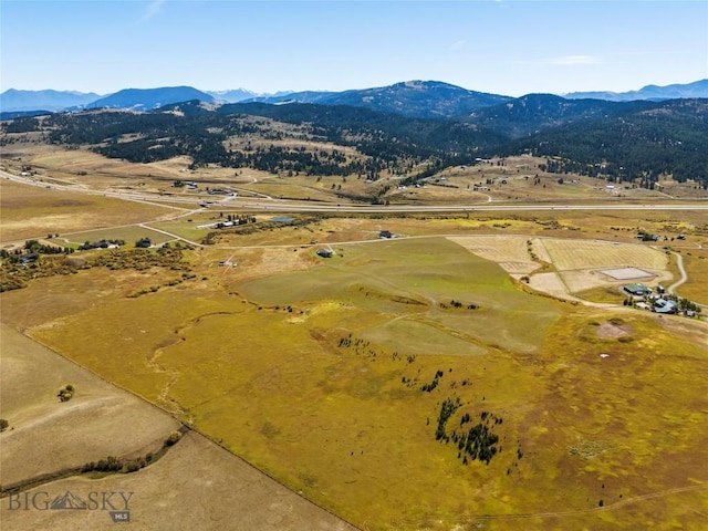 aerial view featuring a mountain view and a rural view