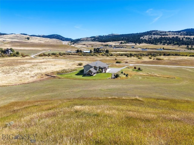 drone / aerial view with a rural view and a mountain view