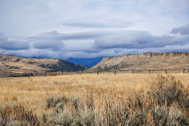 property view of mountains featuring a rural view