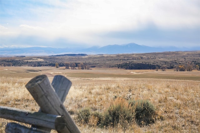 view of mountain feature with a rural view