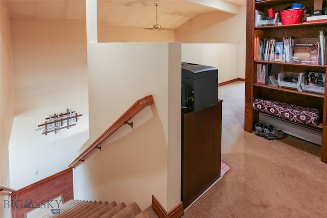 stairs featuring vaulted ceiling and carpet floors