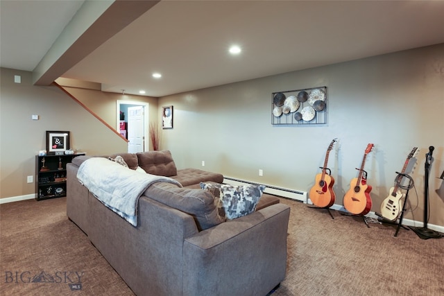 living room featuring a baseboard heating unit and carpet floors