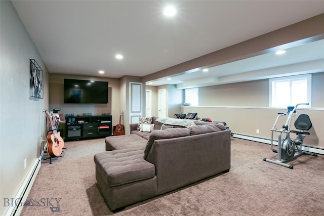 carpeted living room with a baseboard heating unit