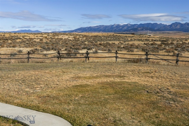 view of mountain feature with a rural view