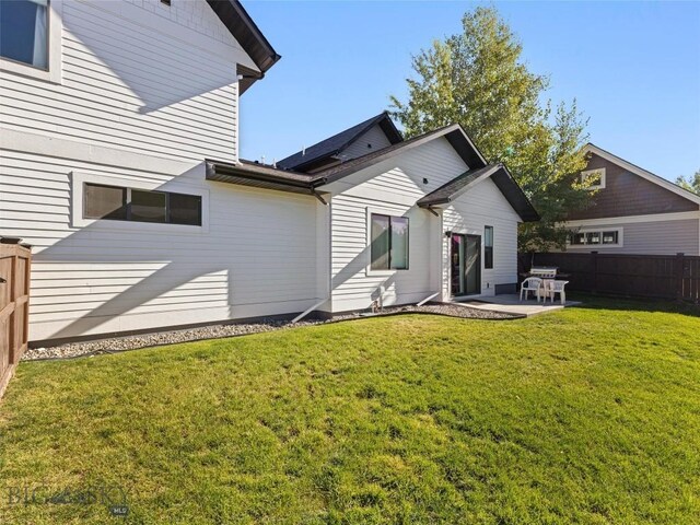 1015 Golden Gate Ave Unit A, Bozeman, MT 59718 - back of house featuring a patio area