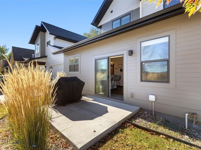 rear view of house featuring a patio