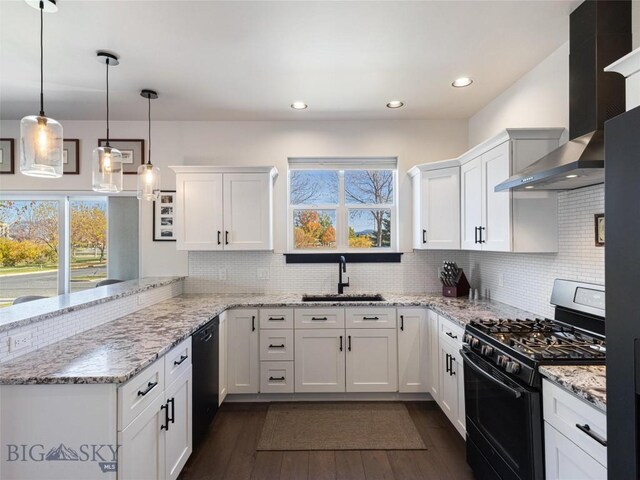 1015 Golden Gate Ave Unit A, Bozeman, MT 59718 - kitchen with black appliances, a peninsula, a sink, wall chimney exhaust hood, and white cabinets