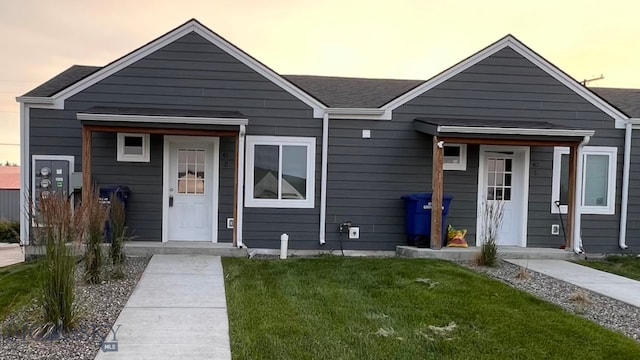 view of front of home featuring a yard