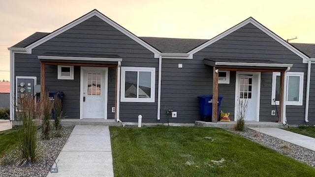 411 Brookline St Unit B, Livingston, MT 59047 - view of front of home featuring a lawn and a shingled roof
