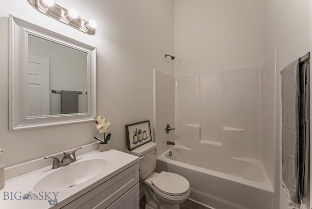 411 Brookline St Unit B, Livingston, MT 59047 - bathroom with toilet, vanity, and washtub / shower combination