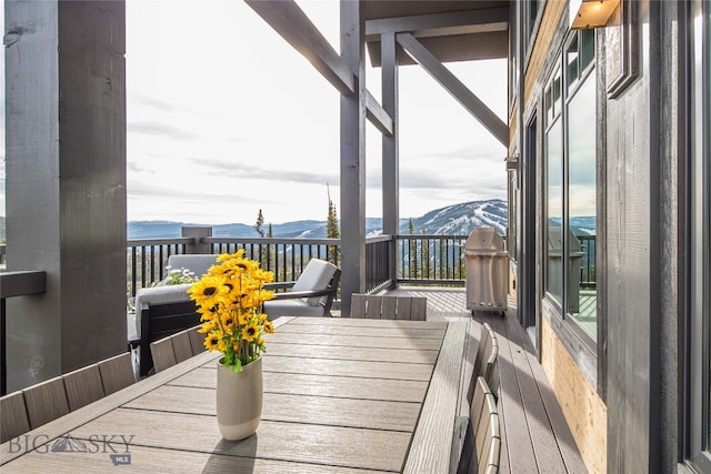 balcony featuring a mountain view