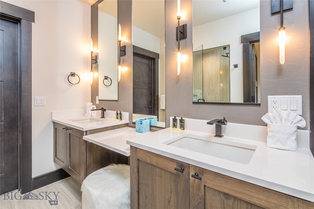 bathroom featuring vanity and walk in shower