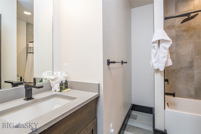 bathroom featuring hardwood / wood-style flooring, vanity, and shower / bath combo with shower curtain