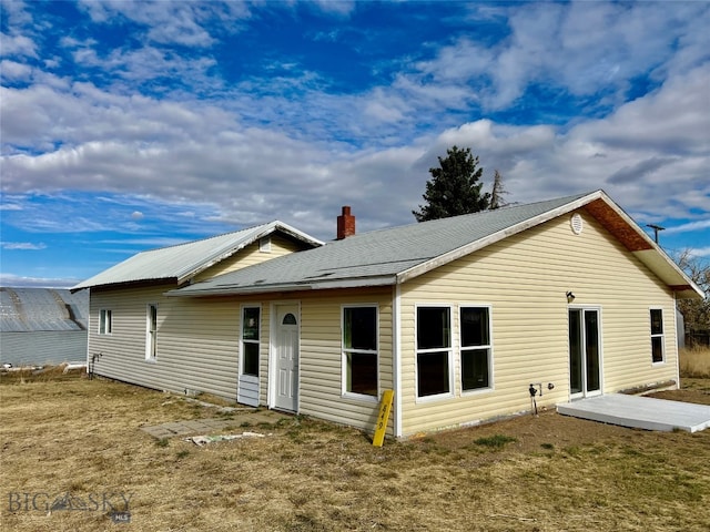 back of house featuring a patio