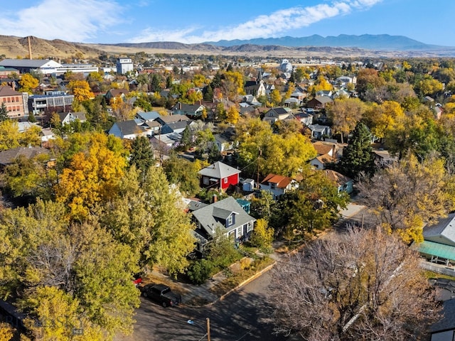 birds eye view of property featuring a mountain view