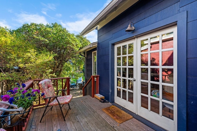 wooden deck featuring french doors