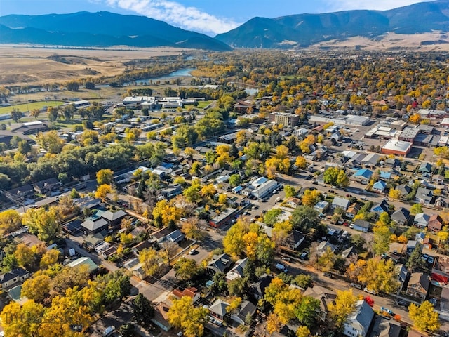 birds eye view of property featuring a mountain view