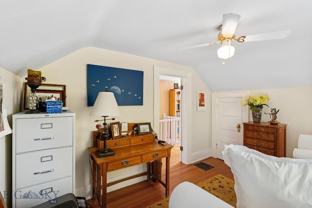 interior space with light hardwood / wood-style floors, ceiling fan, and vaulted ceiling