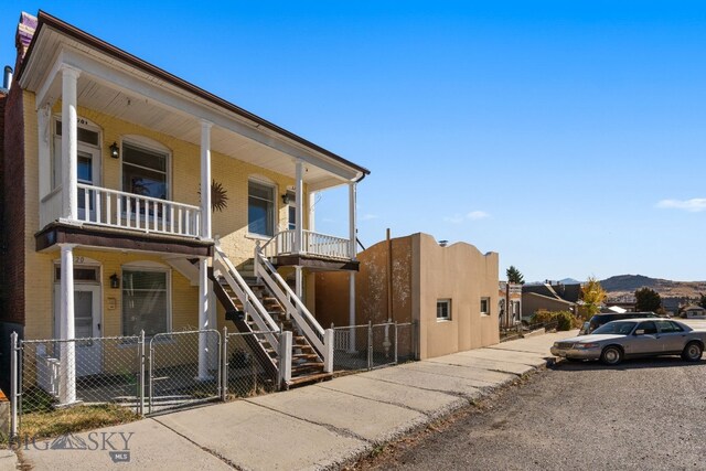 view of building exterior with a mountain view