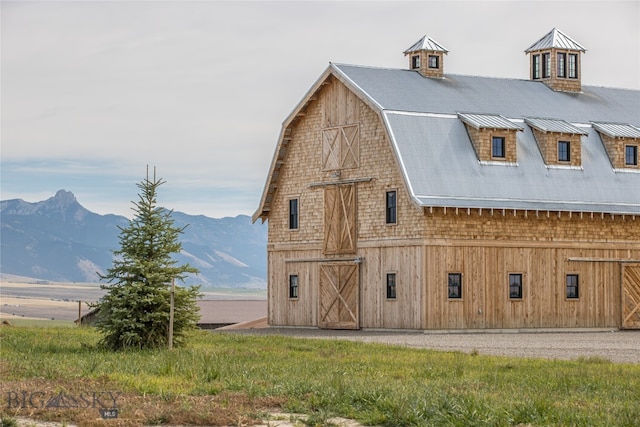 exterior space featuring a mountain view