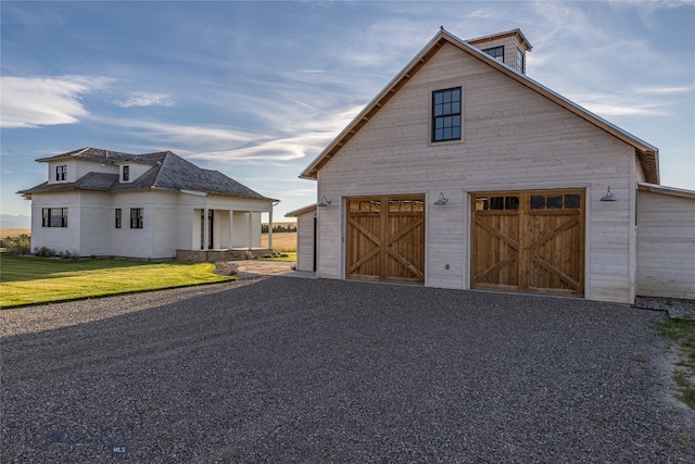 garage with a yard