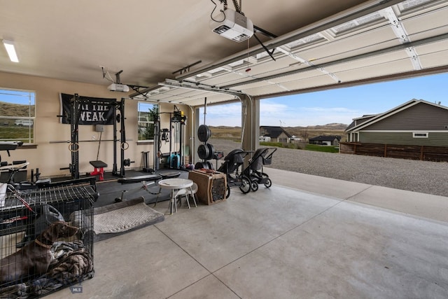 garage featuring a garage door opener