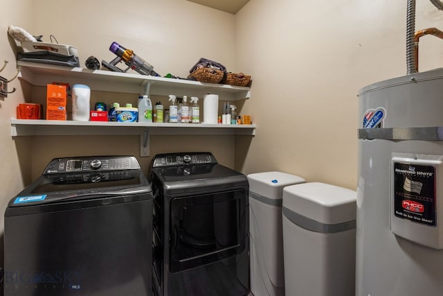 laundry room featuring separate washer and dryer