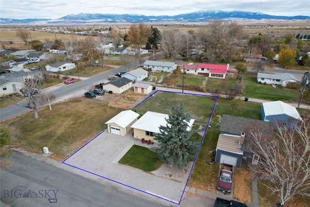 bird's eye view with a mountain view