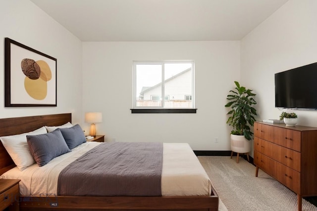 1511 Pistolero Way, Belgrade, MT 59714 - bedroom featuring light carpet and baseboards