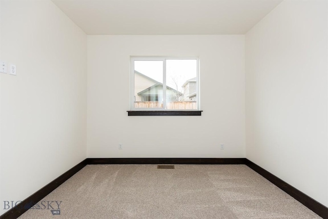 1511 Pistolero Way, Belgrade, MT 59714 - carpeted empty room with baseboards