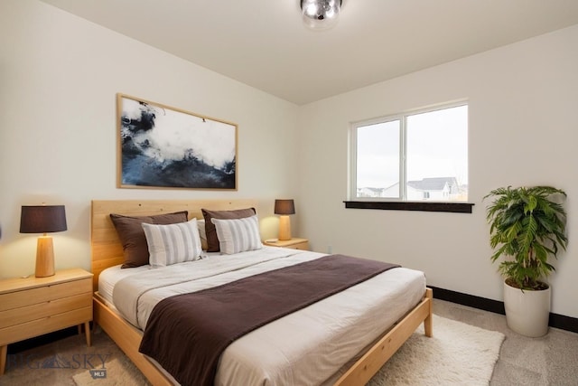 1511 Pistolero Way, Belgrade, MT 59714 - carpeted bedroom featuring baseboards