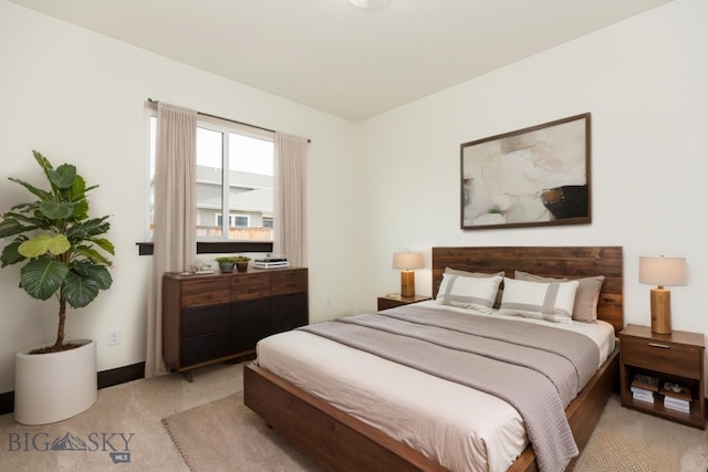 1511 Pistolero Way, Belgrade, MT 59714 - bedroom featuring light colored carpet