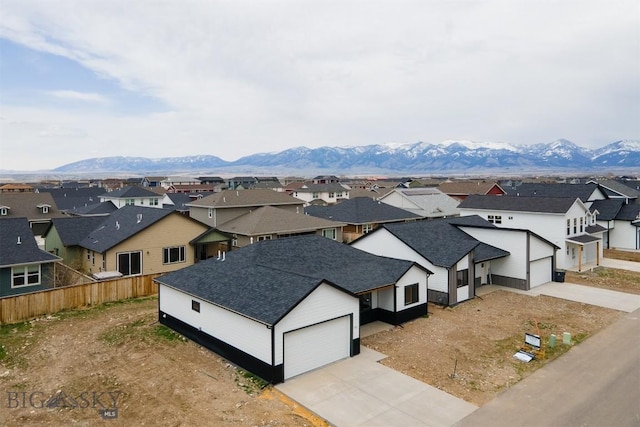 1511 Pistolero Way, Belgrade, MT 59714 - aerial view of residential area featuring a mountain backdrop