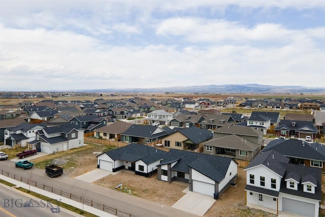 1511 Pistolero Way, Belgrade, MT 59714 - aerial perspective of suburban area with a mountainous background