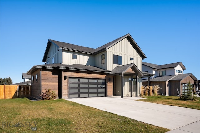 modern farmhouse style home with a garage and a front lawn