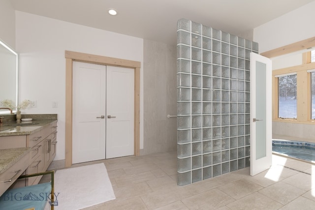 bathroom featuring vanity and tile patterned flooring