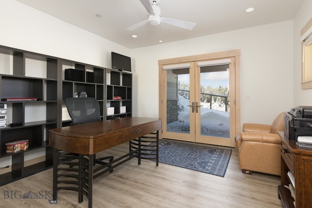 office featuring french doors, hardwood / wood-style flooring, and ceiling fan