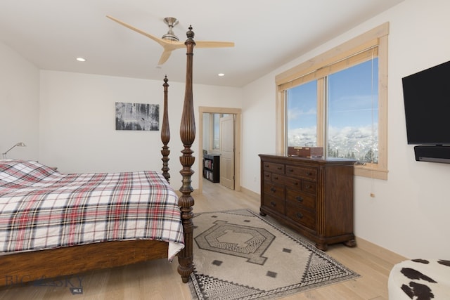 bedroom featuring ceiling fan and light hardwood / wood-style flooring