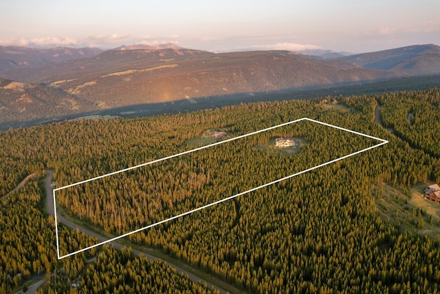 aerial view at dusk with a mountain view